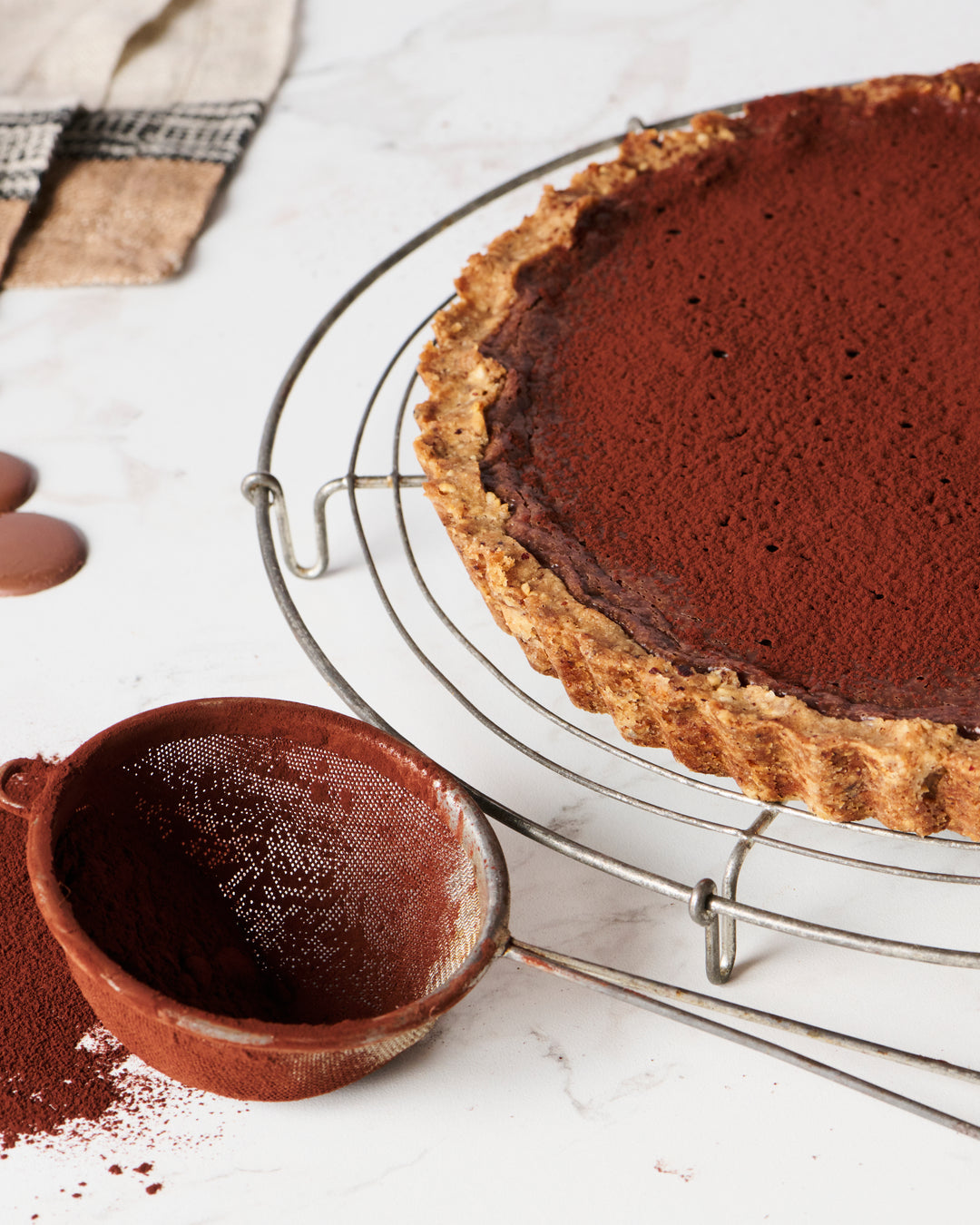 Caramelized Milk Chocolate Tart with Hazelnut Shortbread Crust