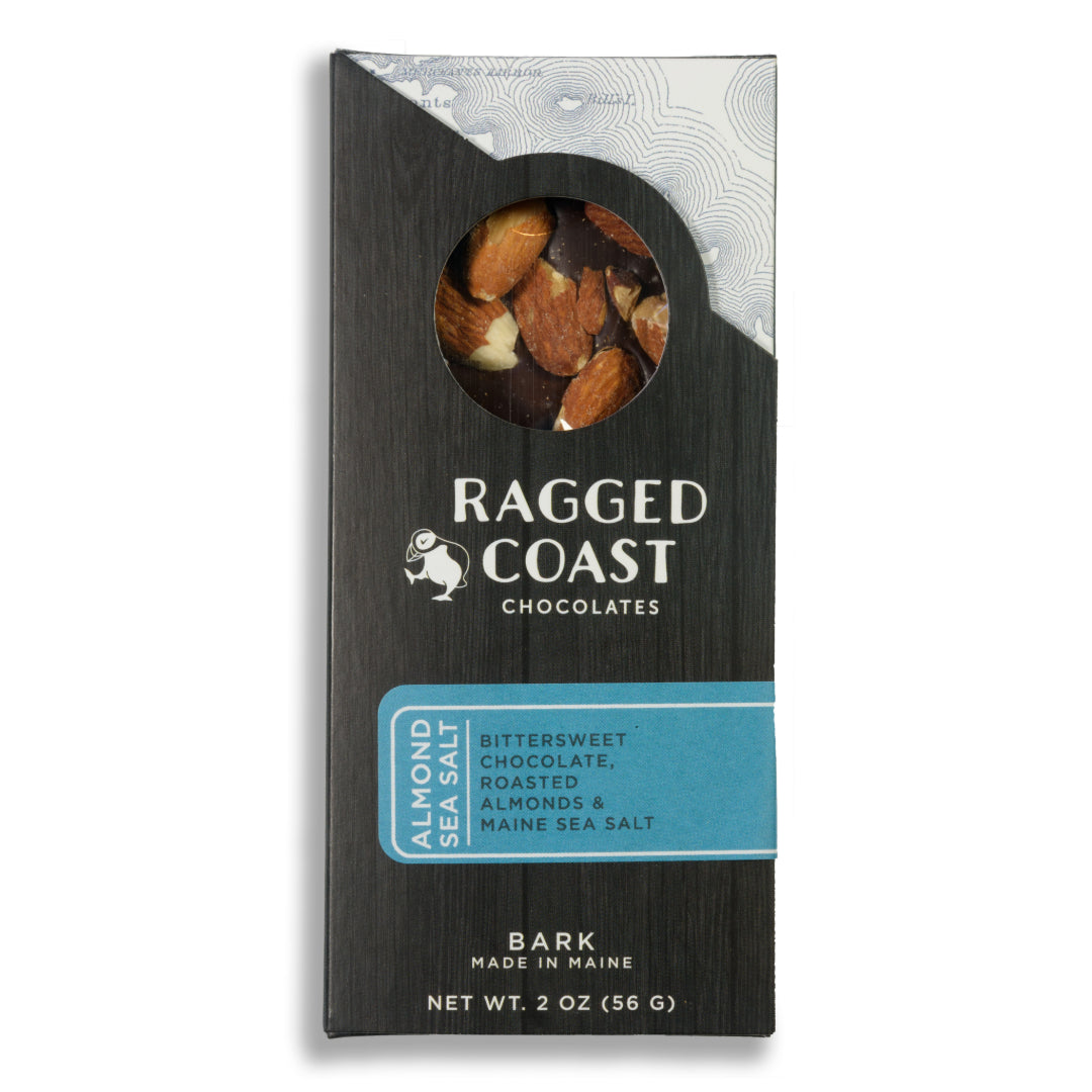 A package of Ragged Coast Chocolates featuring Dark Chocolate Almond and Maine Sea Salt Bark.