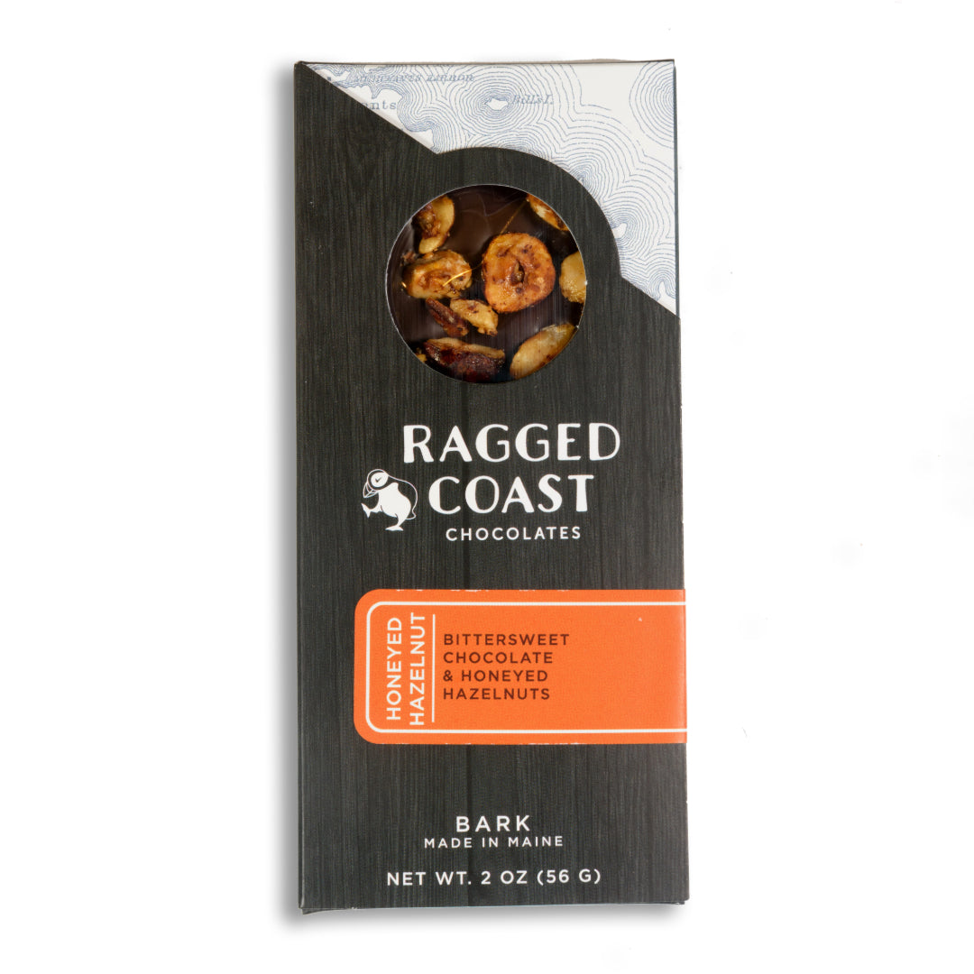 A package of Ragged Coast Chocolates Dark Chocolate and Honeyed Hazelnut Bark, made in Maine.
