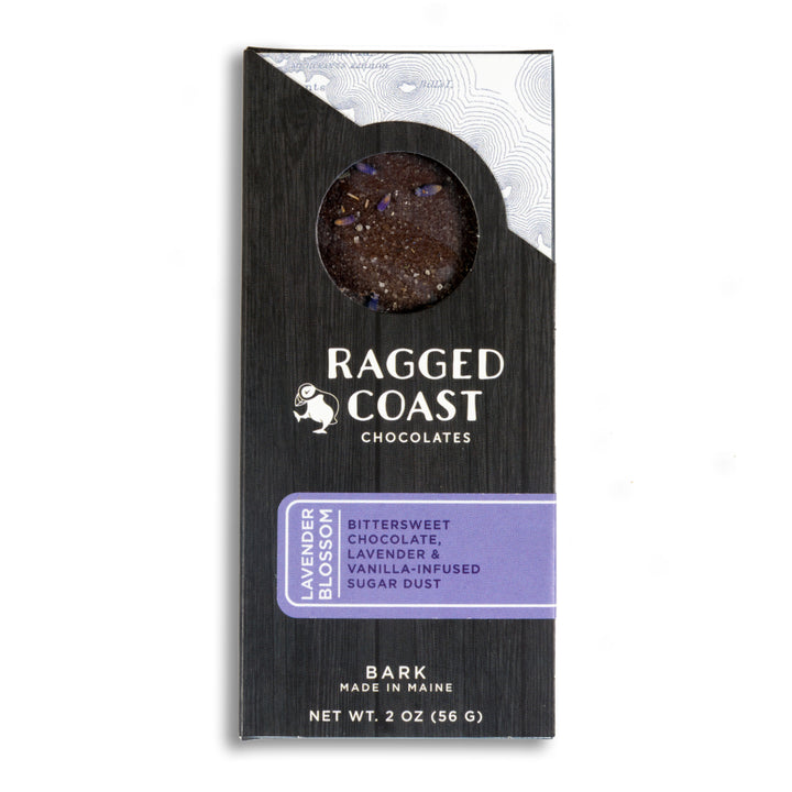 Packaging of Ragged Coast Chocolates' Dark Chocolate Lavender Blossom Bark, featuring bittersweet Ecuadorian dark chocolate with lavender and sea salt-infused sugar dust, made in Maine.