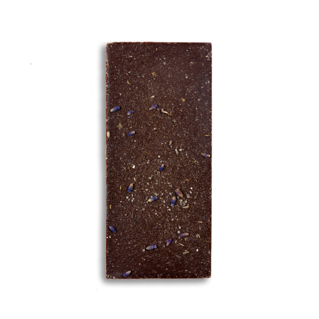 A single Ragged Coast Chocolates Dark Chocolate Lavender Blossom Bark bar with visible inclusions, on a white background.