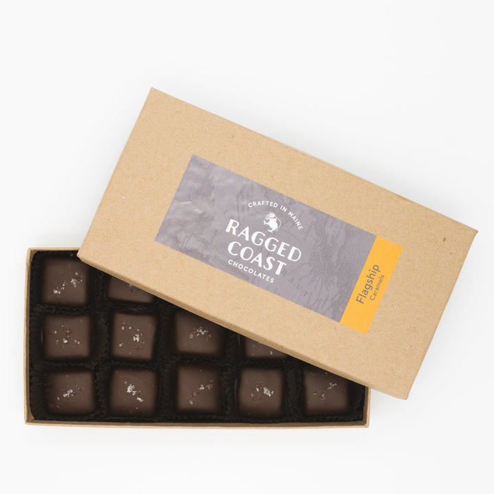 Box of Ragged Coast Chocolates open to display neatly arranged Flagship Sea Salt Caramels.