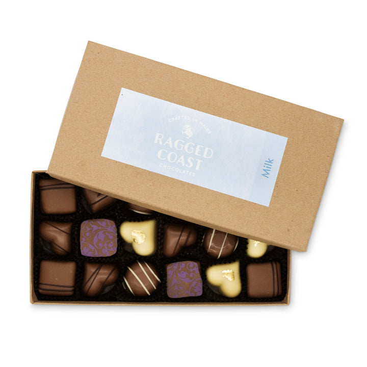 Milk Chocolate Truffle Assortment, including milk chocolate truffles, in a recyclable paperboard box with a "Ragged Coast Chocolates" label.